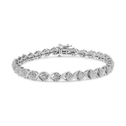White metal bracelet with round white gemstones in prong settings, shown from a slightly angled front view.