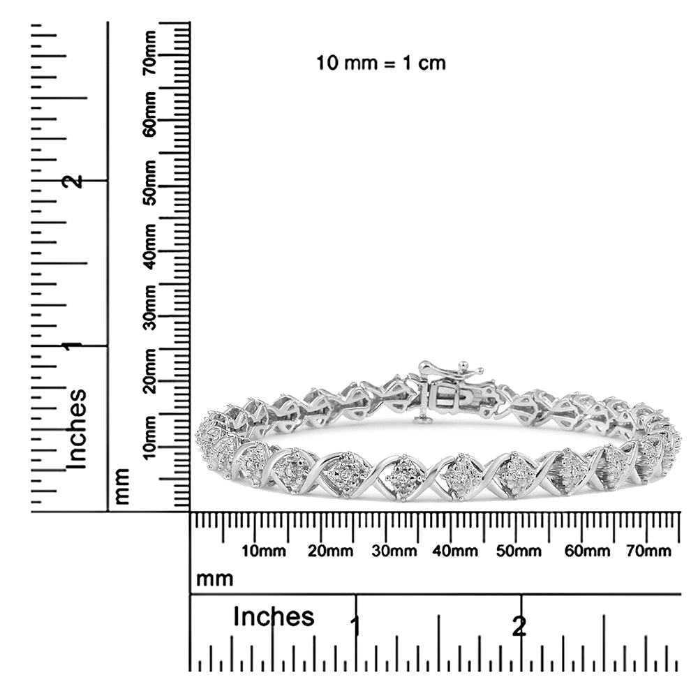 White metal bracelet with round white gemstones in prong settings, displayed flat on a ruler for size reference, front-facing angle.