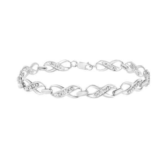 White metal bracelet with alternating twisted link design featuring round white gemstones in prong settings, shown in a side angle view.