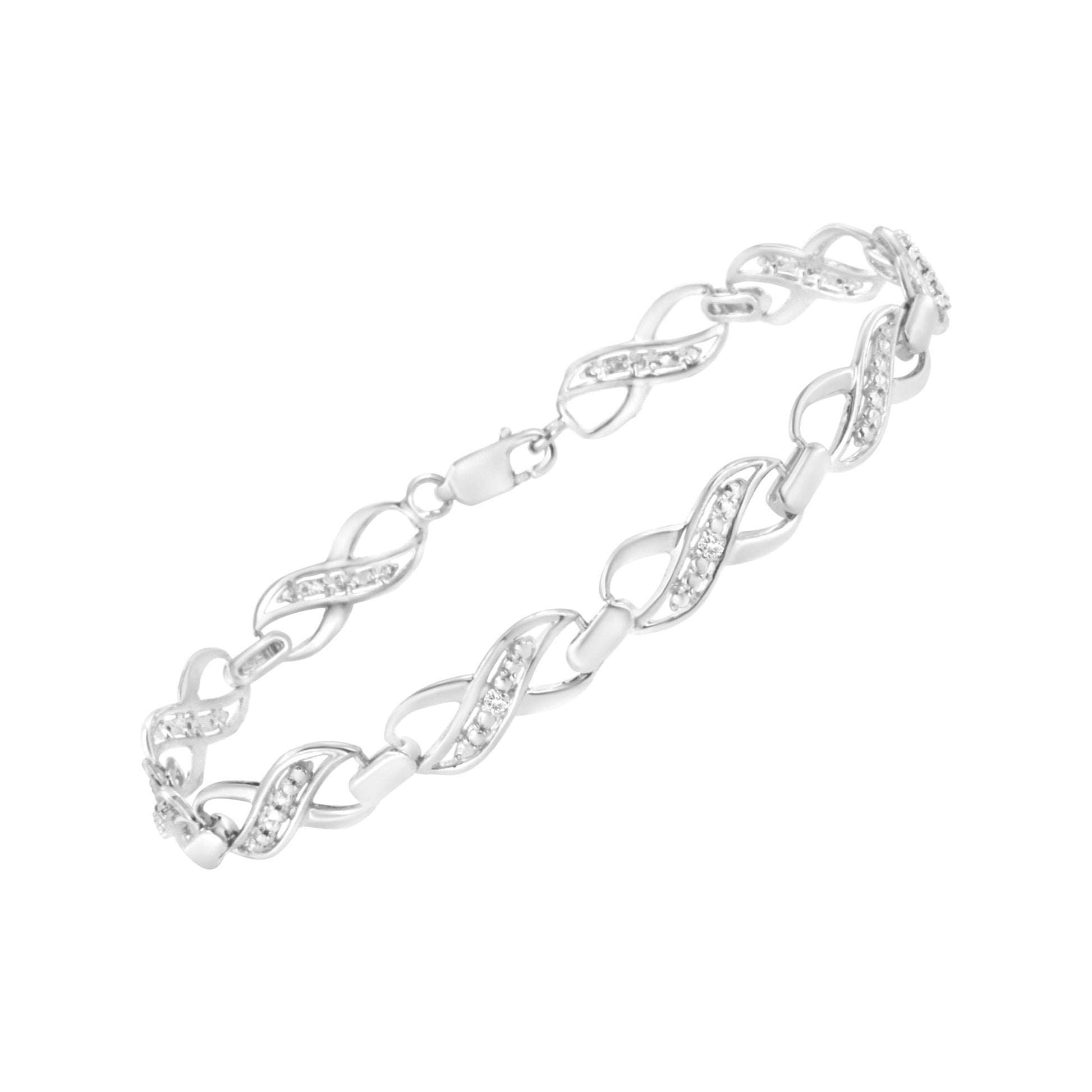 White metal bracelet with alternating smooth and gemstone-studded twisted links, shown at an angle on a white background.