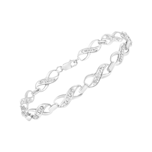 White metal bracelet with alternating smooth and gemstone-studded twisted links, shown at an angle on a white background.