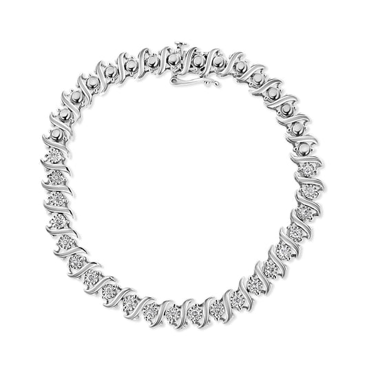 White metal bracelet with round white gemstones in a circular design, shown from a top-down angle.