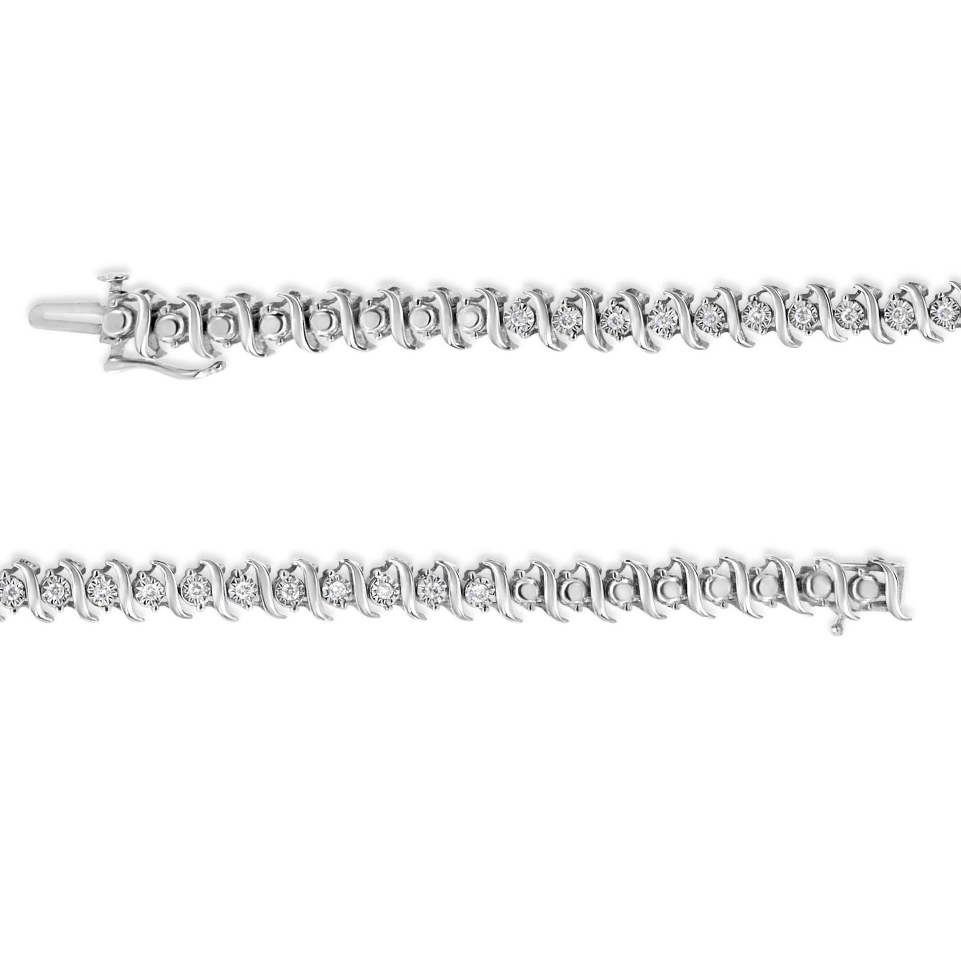Close-up top view of a white metal bracelet with round white gemstones in a miracle setting.