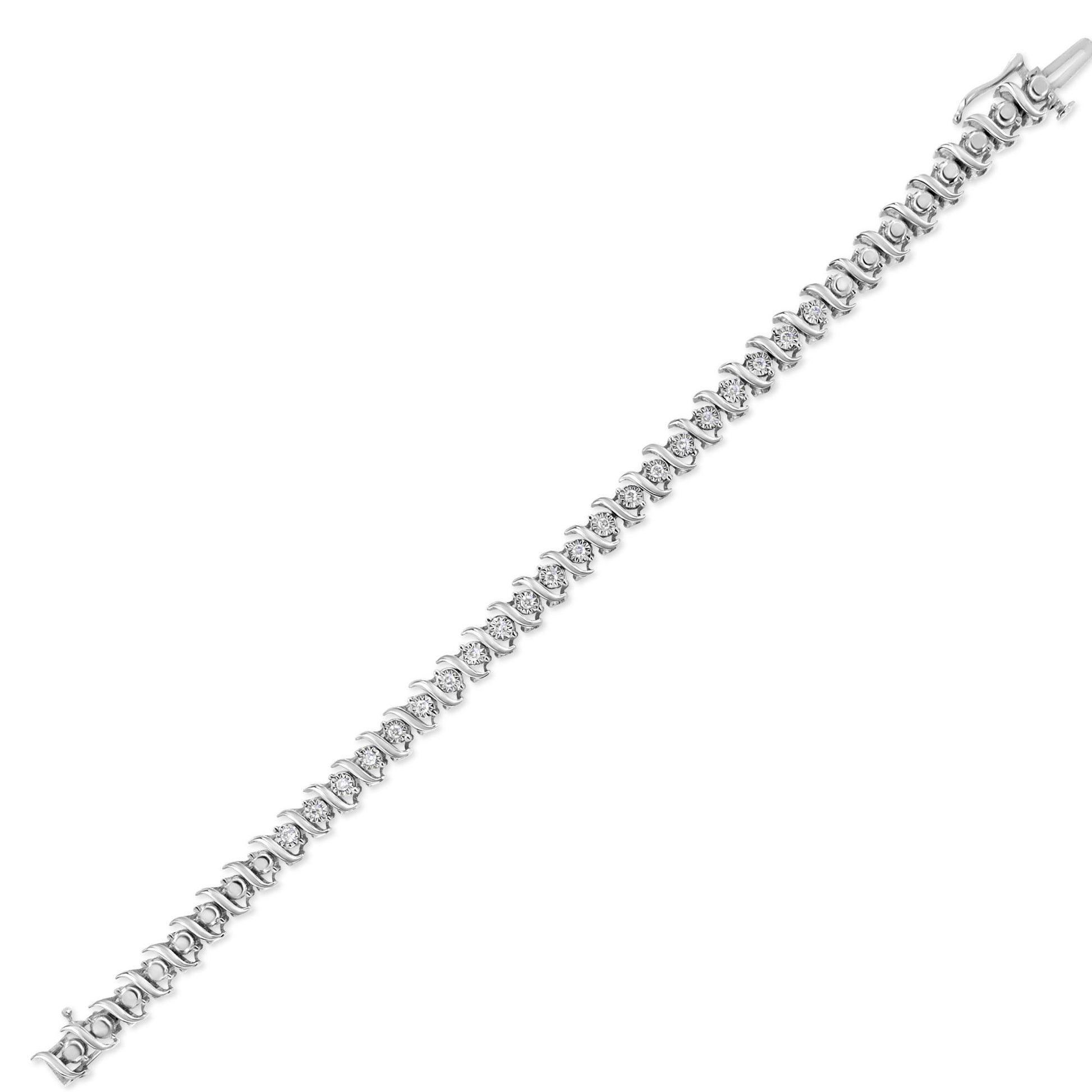 White metal bracelet with round white gemstones in a miracle setting, shown flat at a slight diagonal angle.