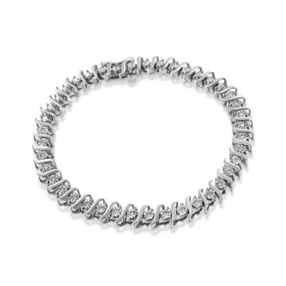 Bracelet with white metal links featuring round white gemstones in a spiral design, shown from a top angle.