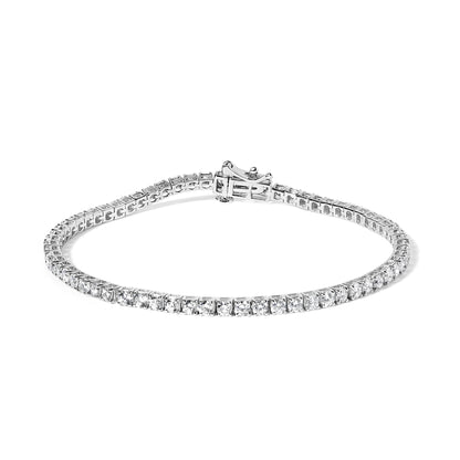 White metal tennis bracelet with round white gemstones in four-prong settings, shown at front-facing angle on white background.