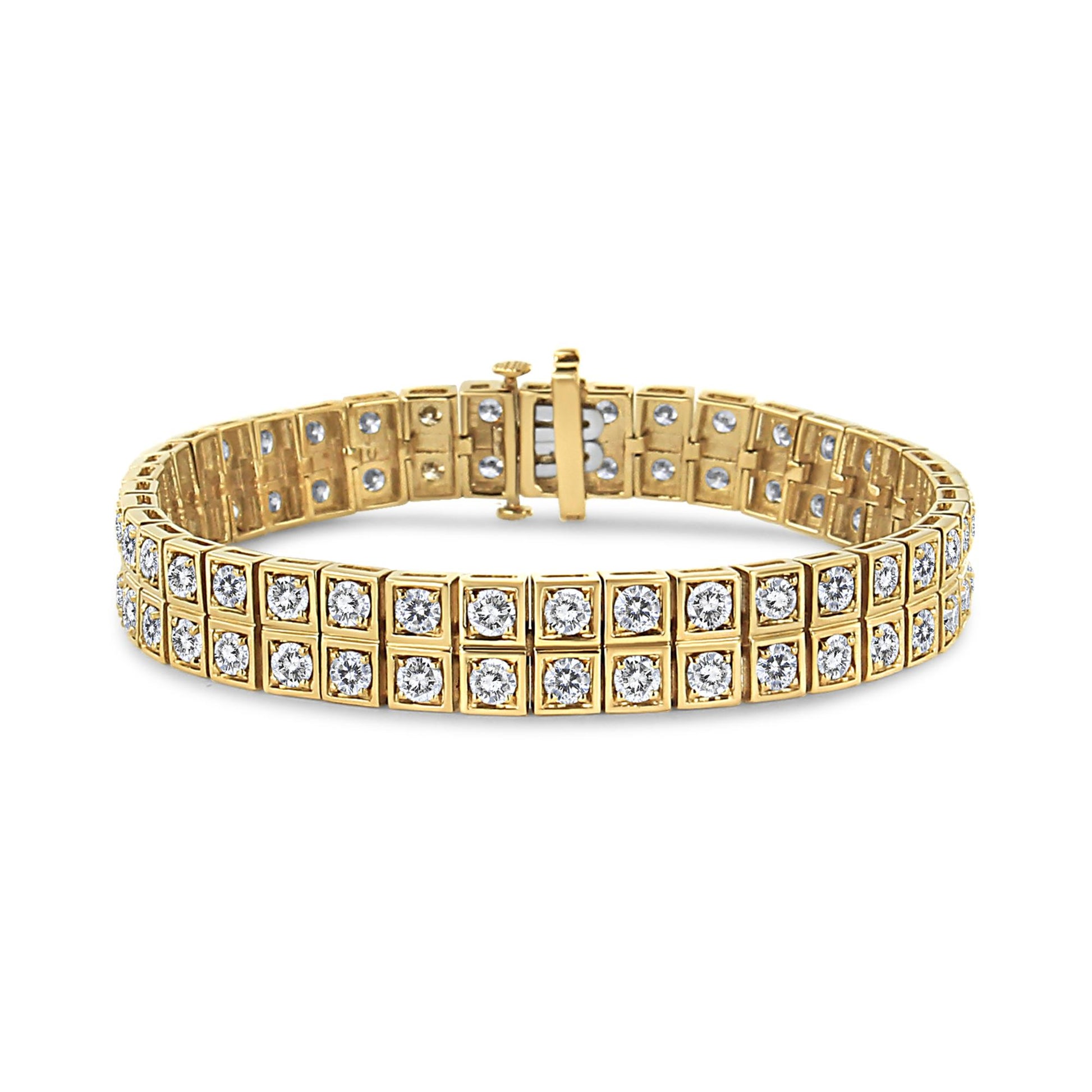 Yellow metal bracelet with two rows of round white gemstones in prong settings, shown from a front angle.