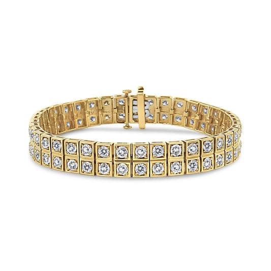 Yellow metal bracelet with two rows of round white gemstones in prong settings, shown from a front angle.