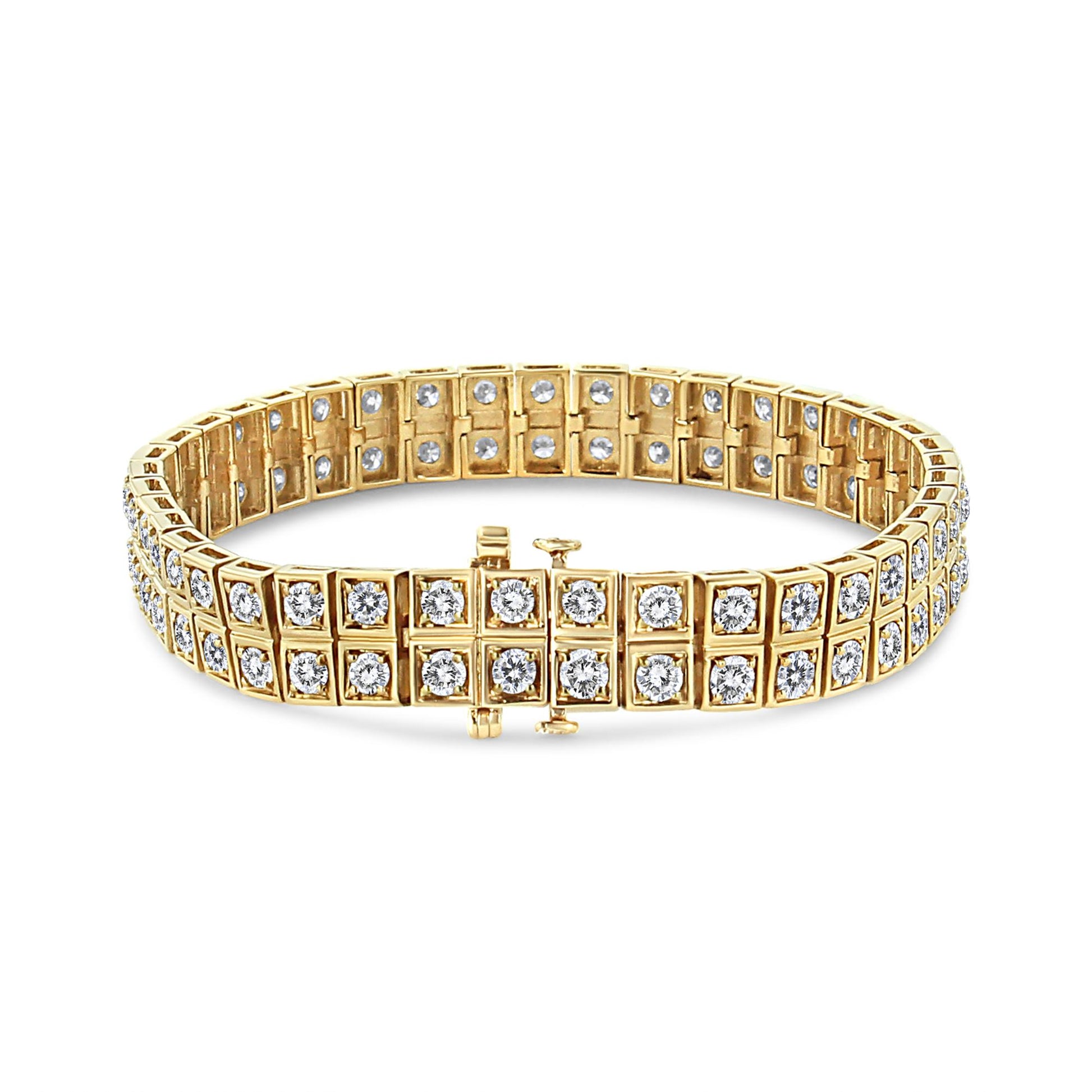 Yellow metal bracelet with round white gemstones in prong settings, shown from a front angle on a white background.