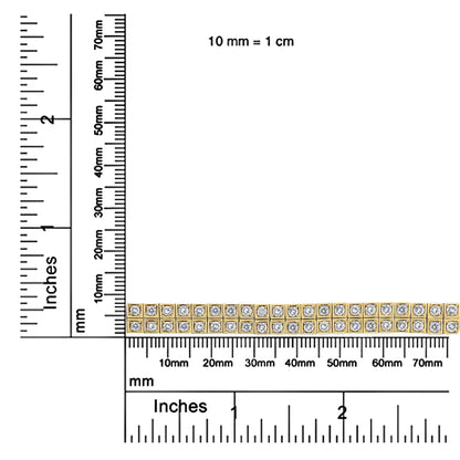 Yellow metal bracelet with two rows of round white gemstones in prong settings, shown flat on a ruler for size reference, top-down angle.