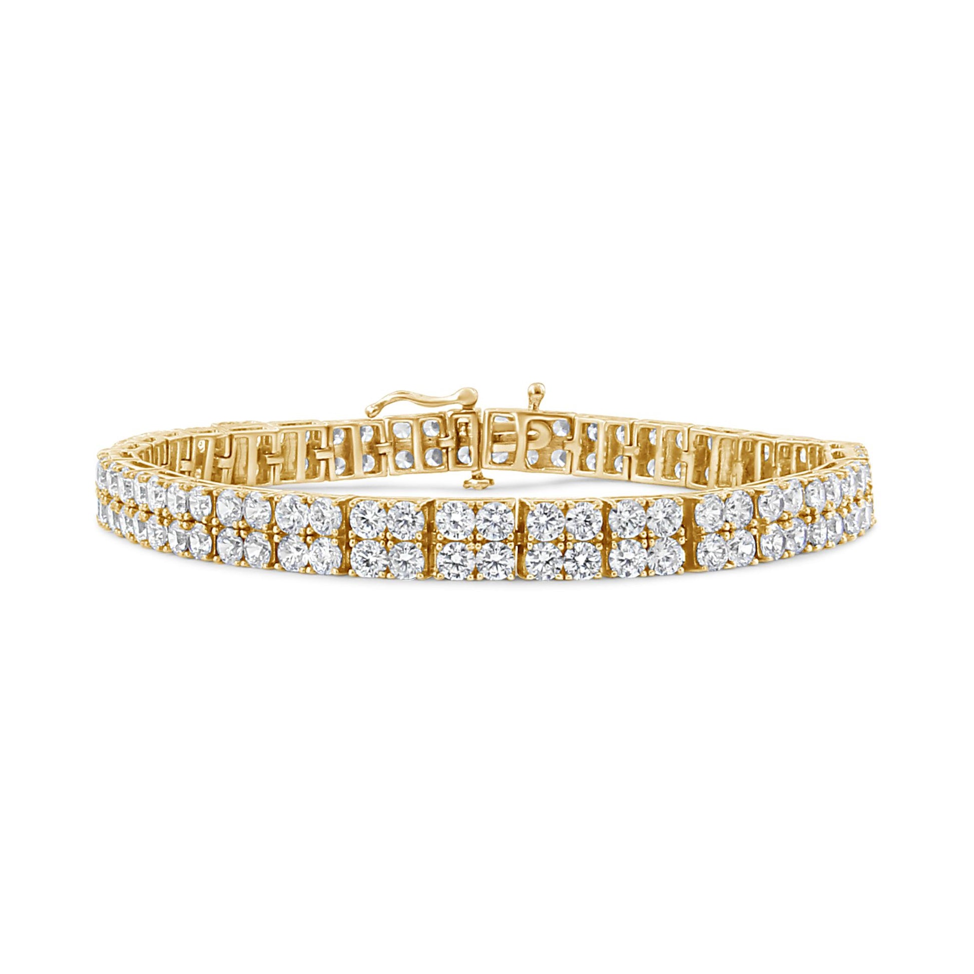 Yellow metal bracelet with two rows of round white gemstones in 4-prong settings, shown from the front angle.