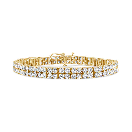 Yellow metal bracelet with two rows of round white gemstones in 4-prong settings, shown from the front angle.