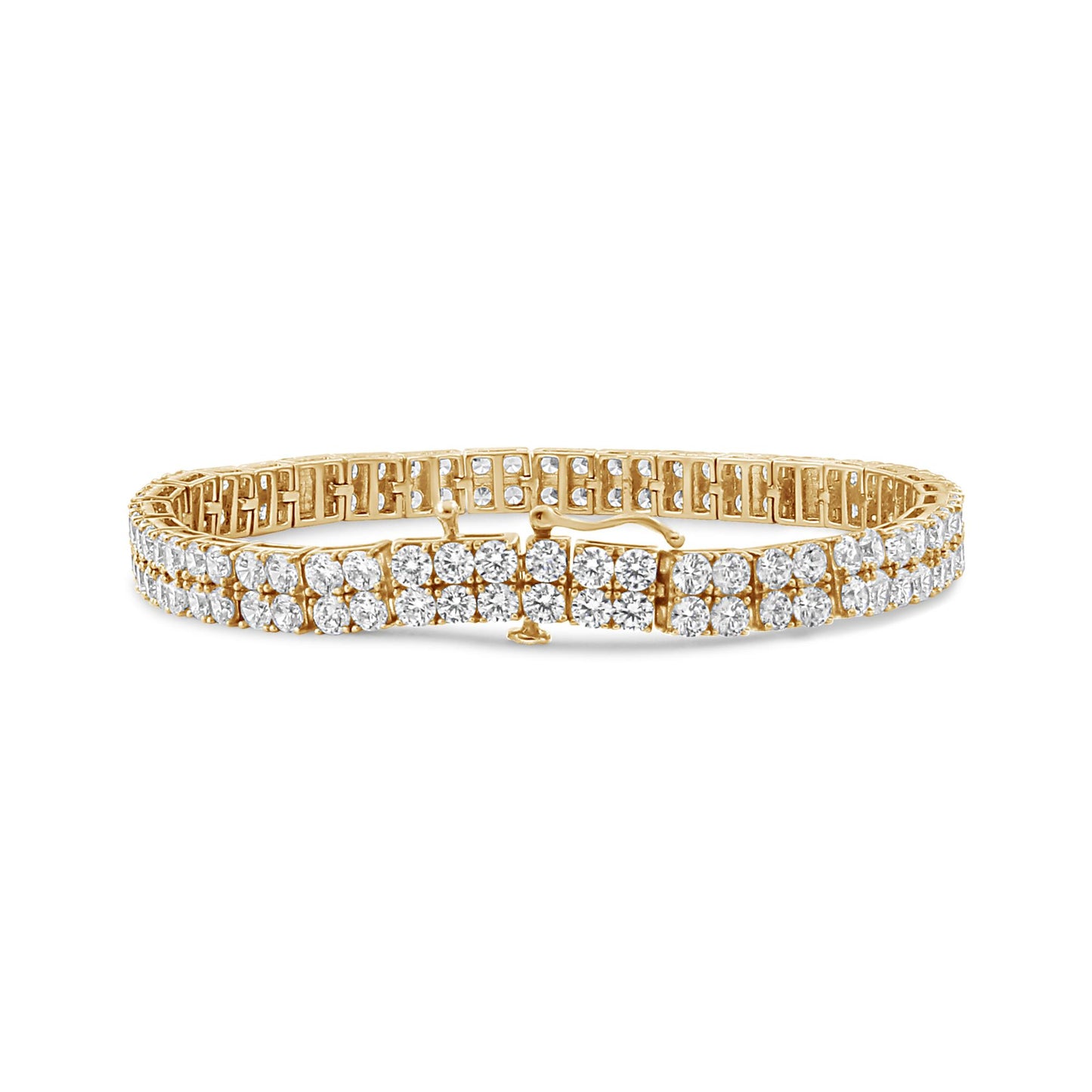 Yellow metal bracelet with round brownish gemstones in 4-prong settings, shown in a front angle shot on a white background.