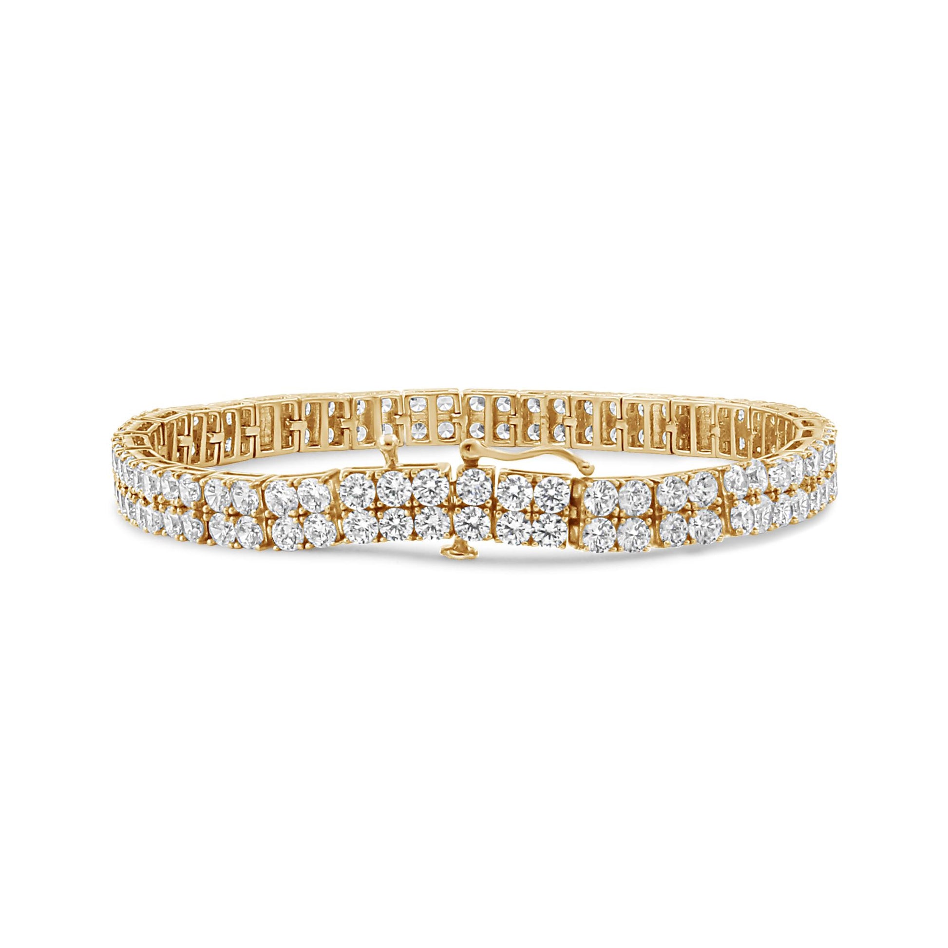Yellow metal bracelet with round brownish gemstones in 4-prong settings, shown in a front angle shot on a white background.