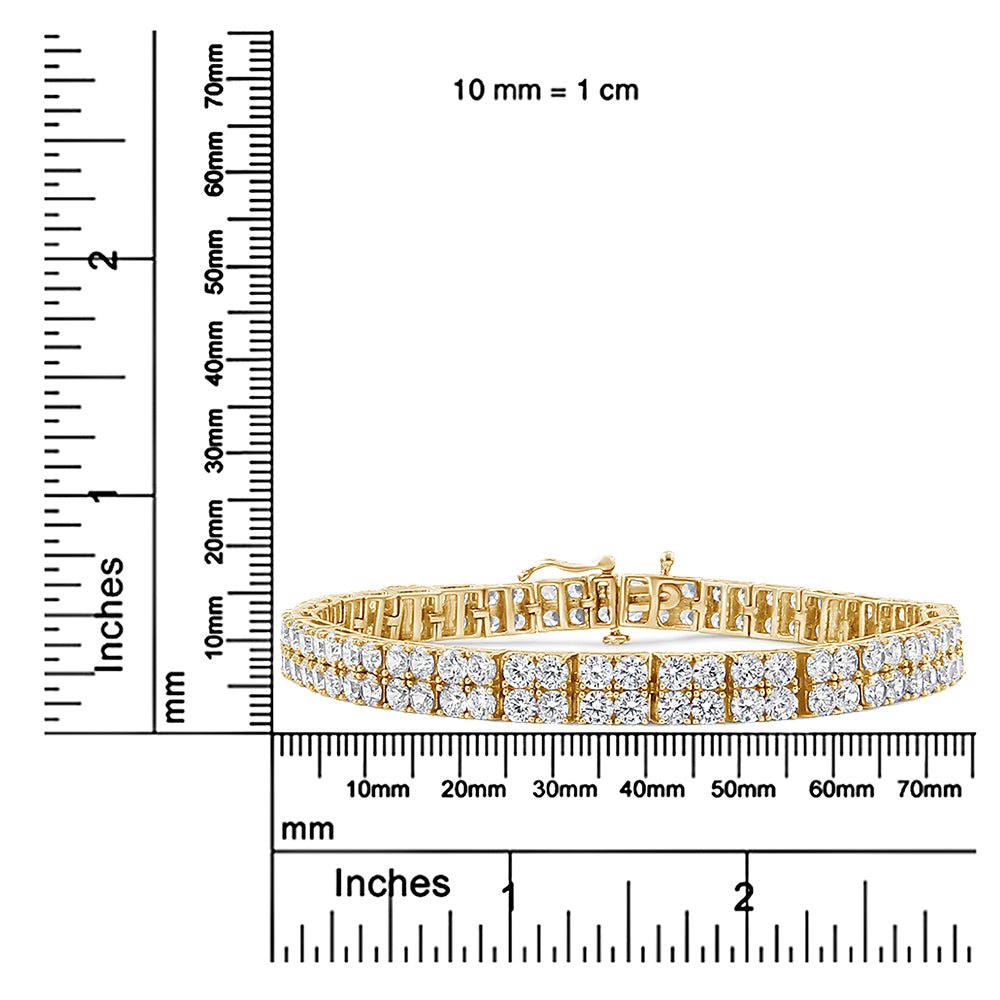 Yellow bracelet with two rows of round white gemstones in a 4-prong setting, displayed on a ruler for size reference, front angled view.
