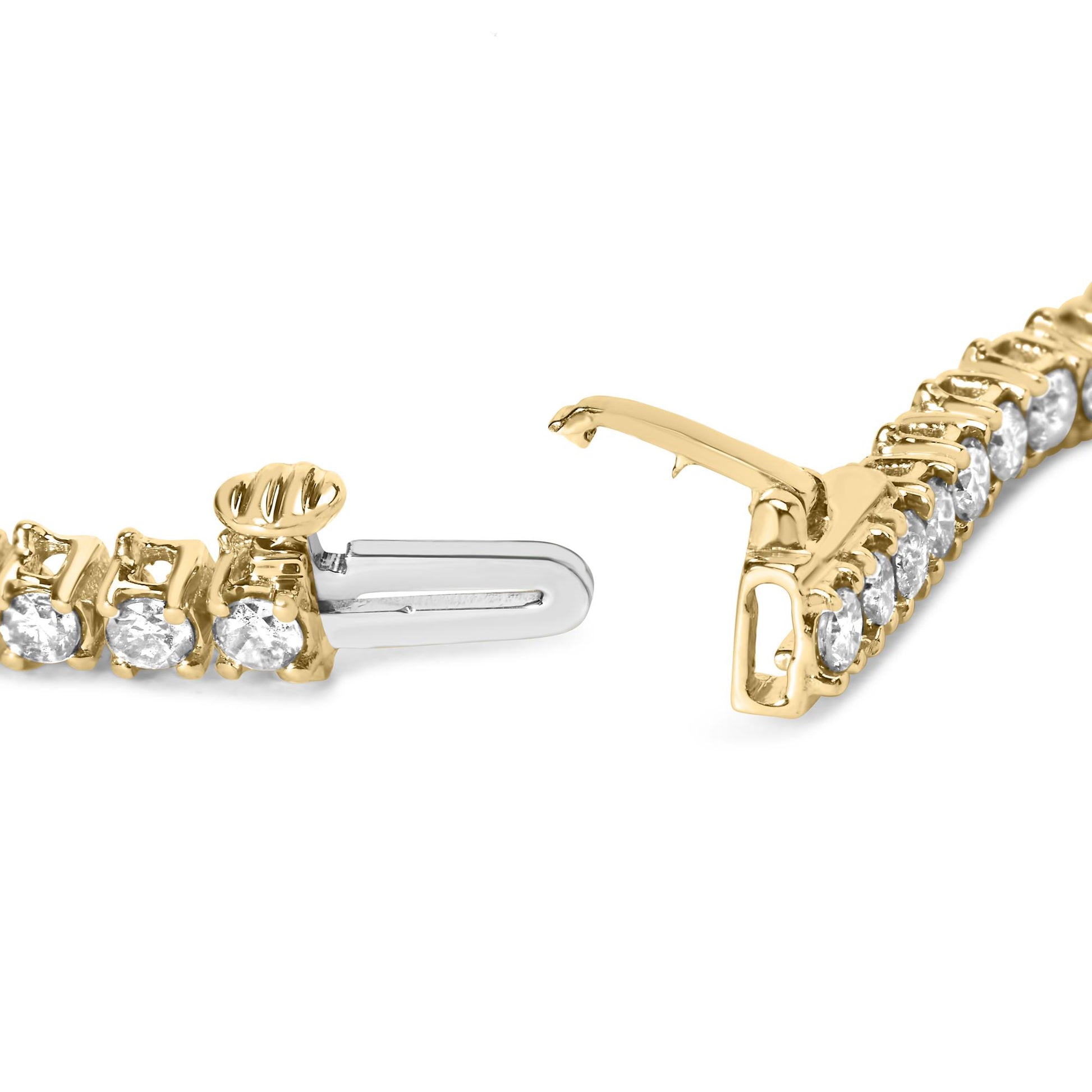Close-up angled view of a yellow bracelet with round white gemstones in prong settings and an open clasp.