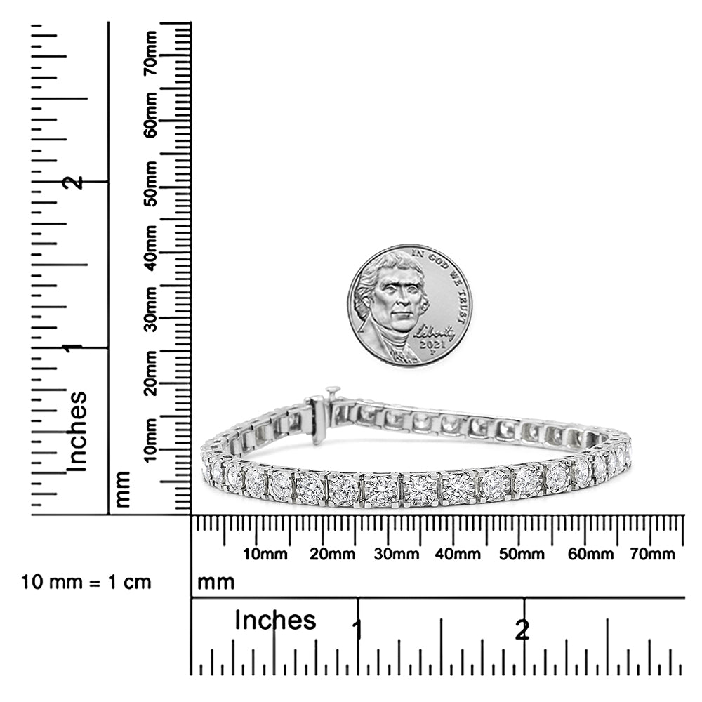 White bracelet with round white gemstones in miracle setting, displayed flat on rulers for size reference, front angled view.
