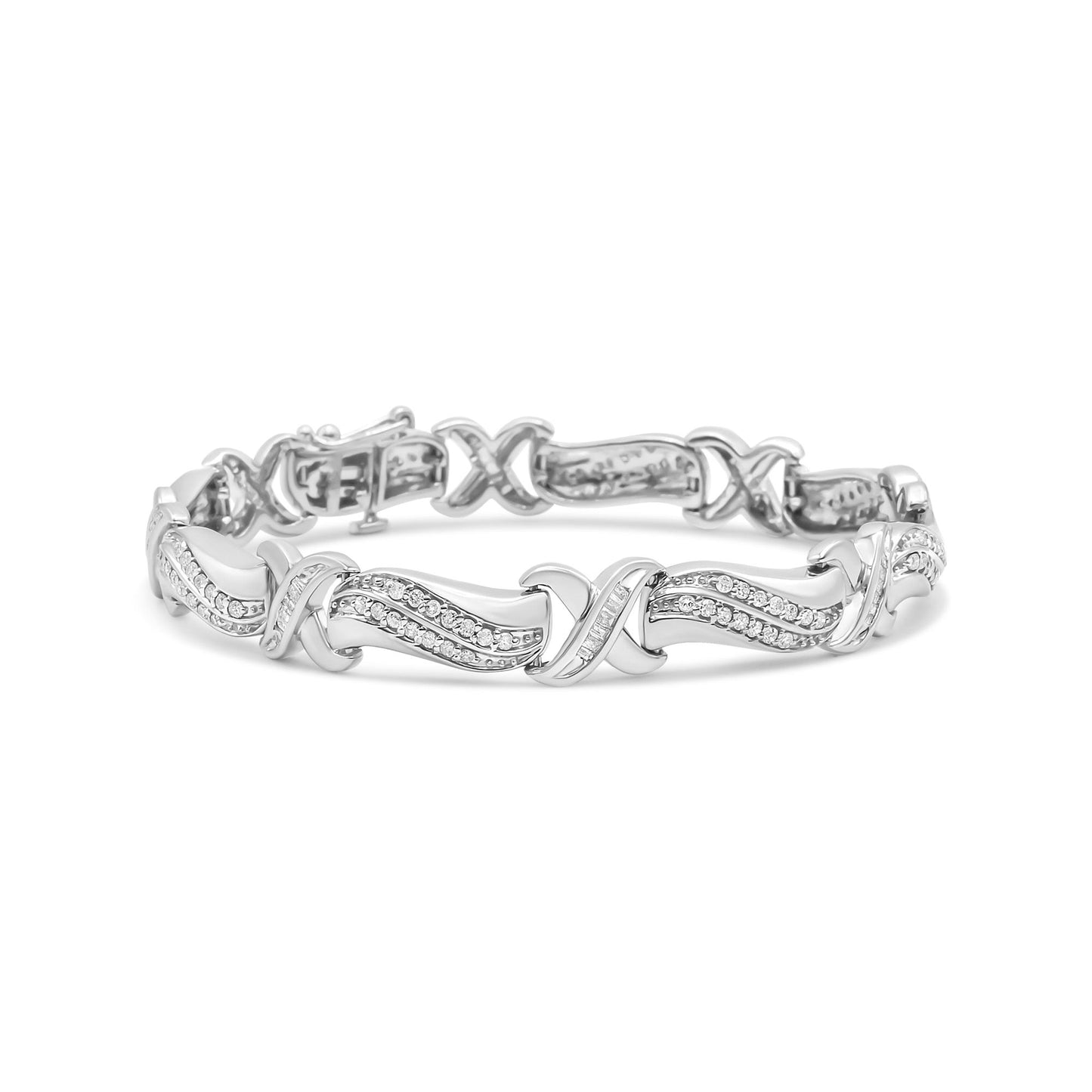 White metal bracelet with crisscross and wave design featuring round and baguette shaped white gemstones, shown from front angle.