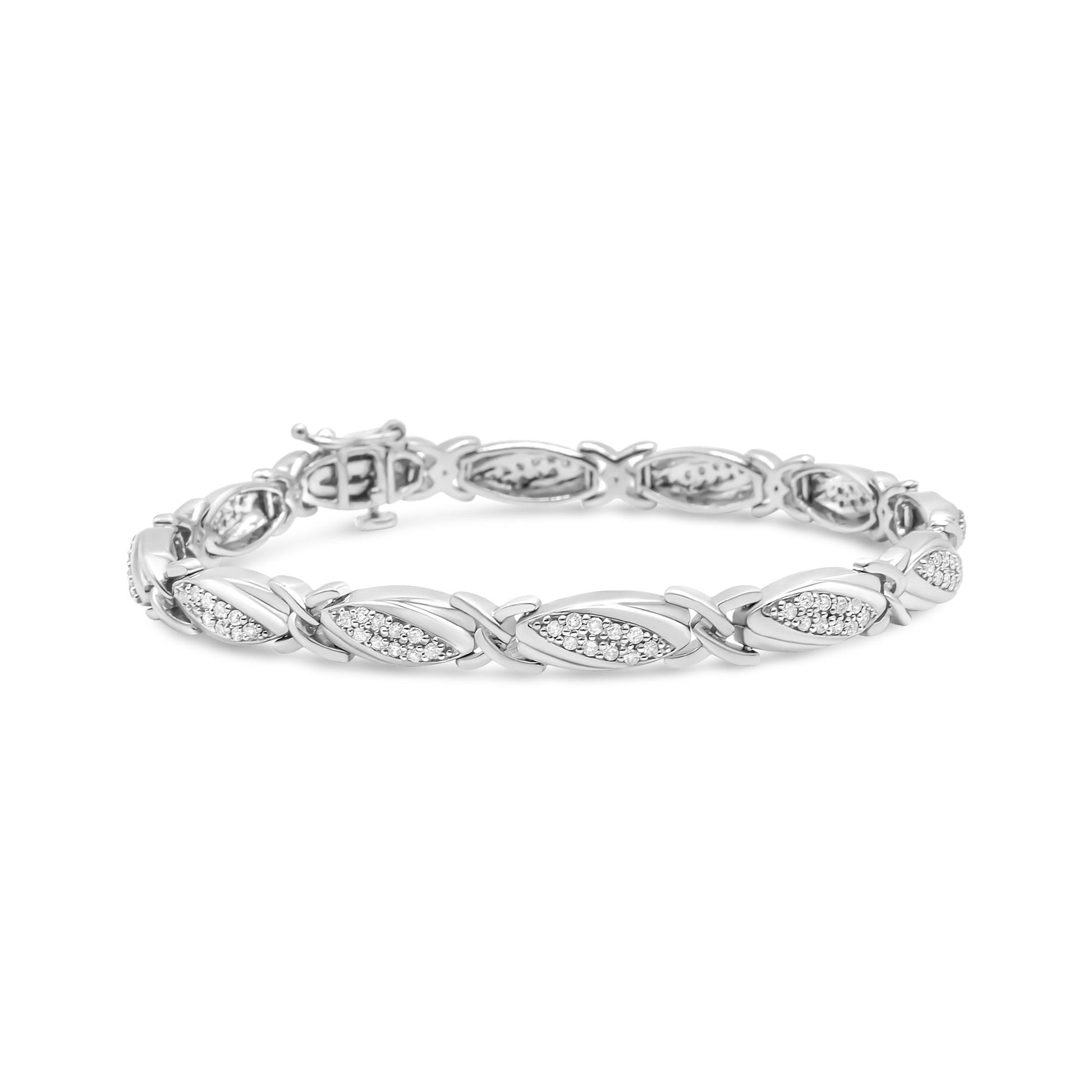 White metal bracelet with alternating marquise-shaped links set with white round gemstones in prong settings, shown at a slight angle.