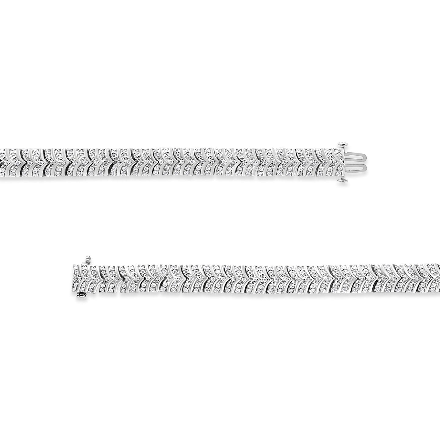 Top-down view of two white metal bracelets with chevron pattern, each set with multiple round white gemstones in pave setting.