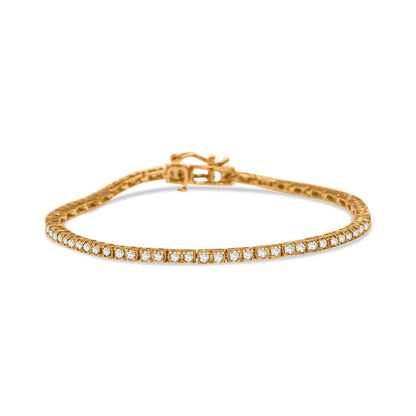 Yellow metal bracelet with round champagne-colored gemstones in prong settings, shown at a slight side angle.
