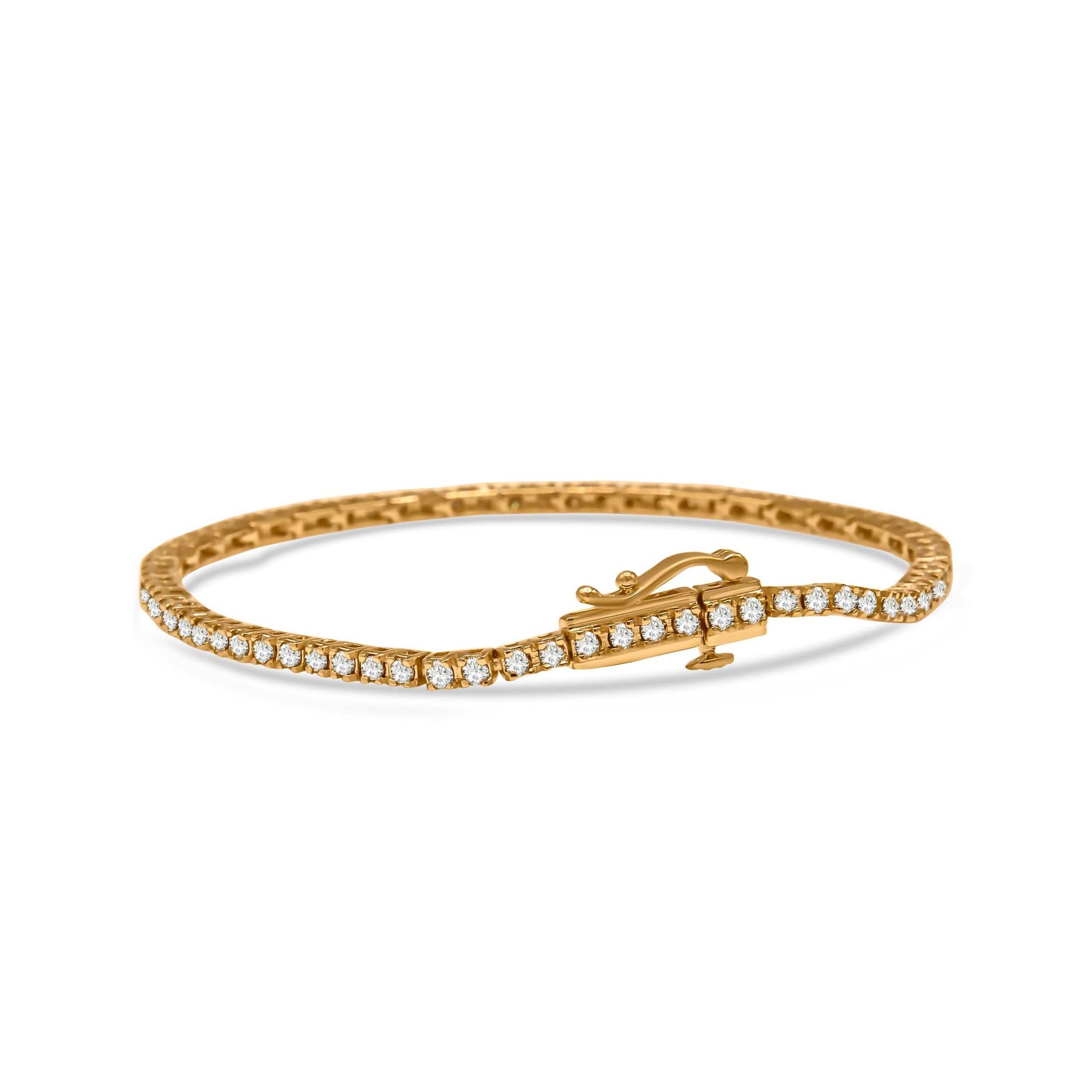 Yellow metal bracelet with round champagne-colored gemstones in prong setting, shown from a side angle.