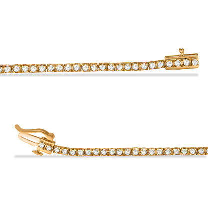Close-up front angle of a yellow bracelet featuring round prong-set champagne-colored gemstones along its length with a clasp visible at one end.