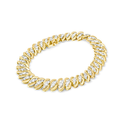 Yellow metal bracelet with twisted links each set with clusters of small white round gemstones, shown from a top angled view on a white background.