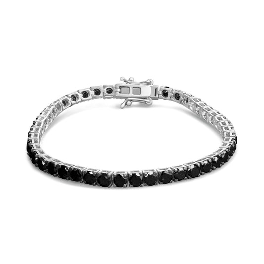 White metal bracelet with round black gemstones in prong setting, shown from a front angle.