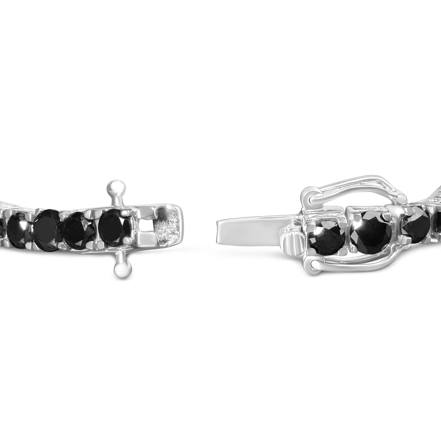 Close-up side view of white metal bracelet with round black gemstones in prong settings, showing clasp mechanism.