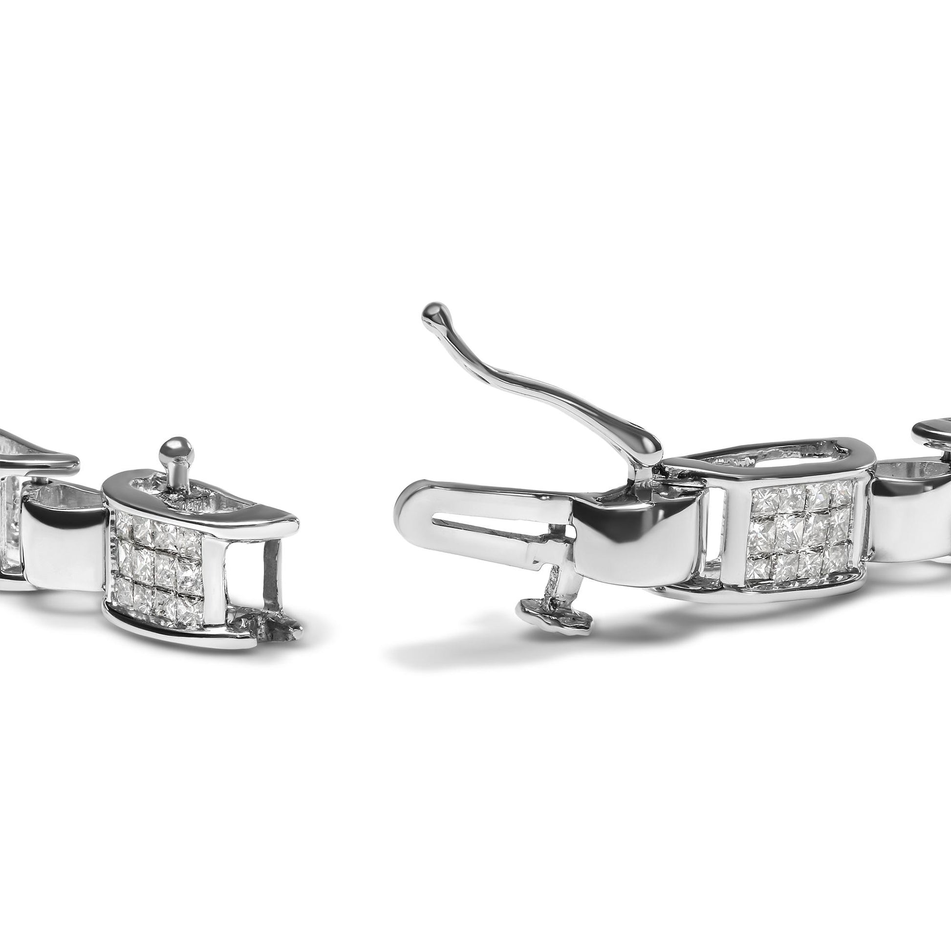 Close-up angled view of a white metal bracelet clasp featuring two sections set with multiple princess-shaped white gemstones in an invisible setting.
