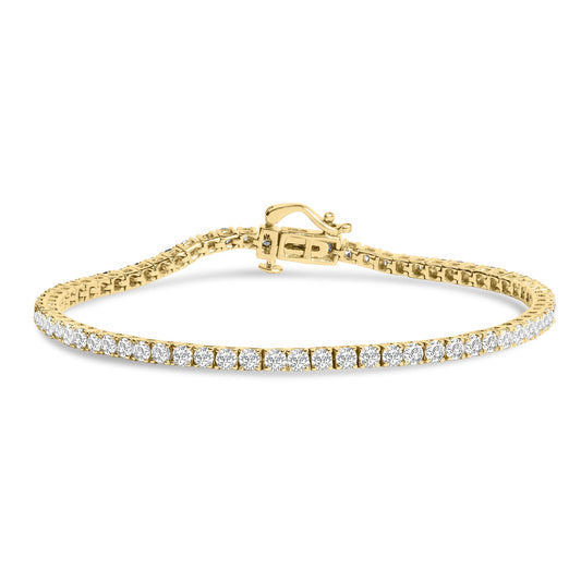 Yellow metal bracelet with round white gemstones in 4-prong settings, shown from a straight-on angle.
