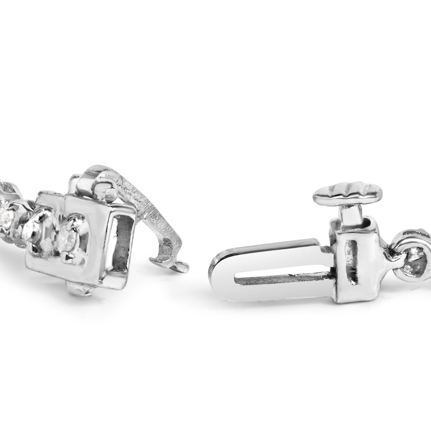 Close-up front angle of a white bracelet with round white gemstones in prong settings, showing the clasp mechanism.