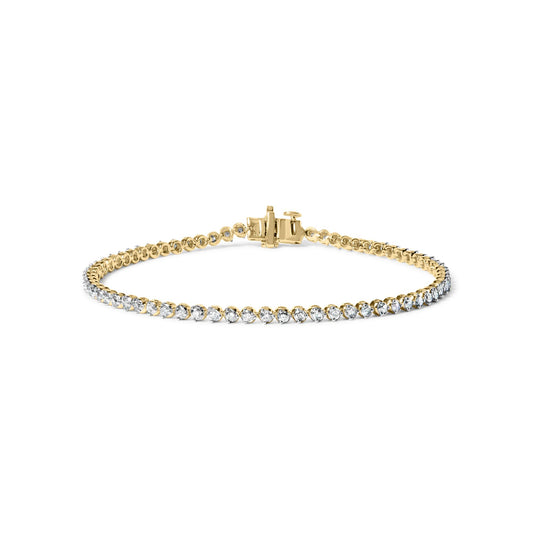 Yellow metal bracelet with round white gemstones in prong settings, shown from a front angle on a white background.