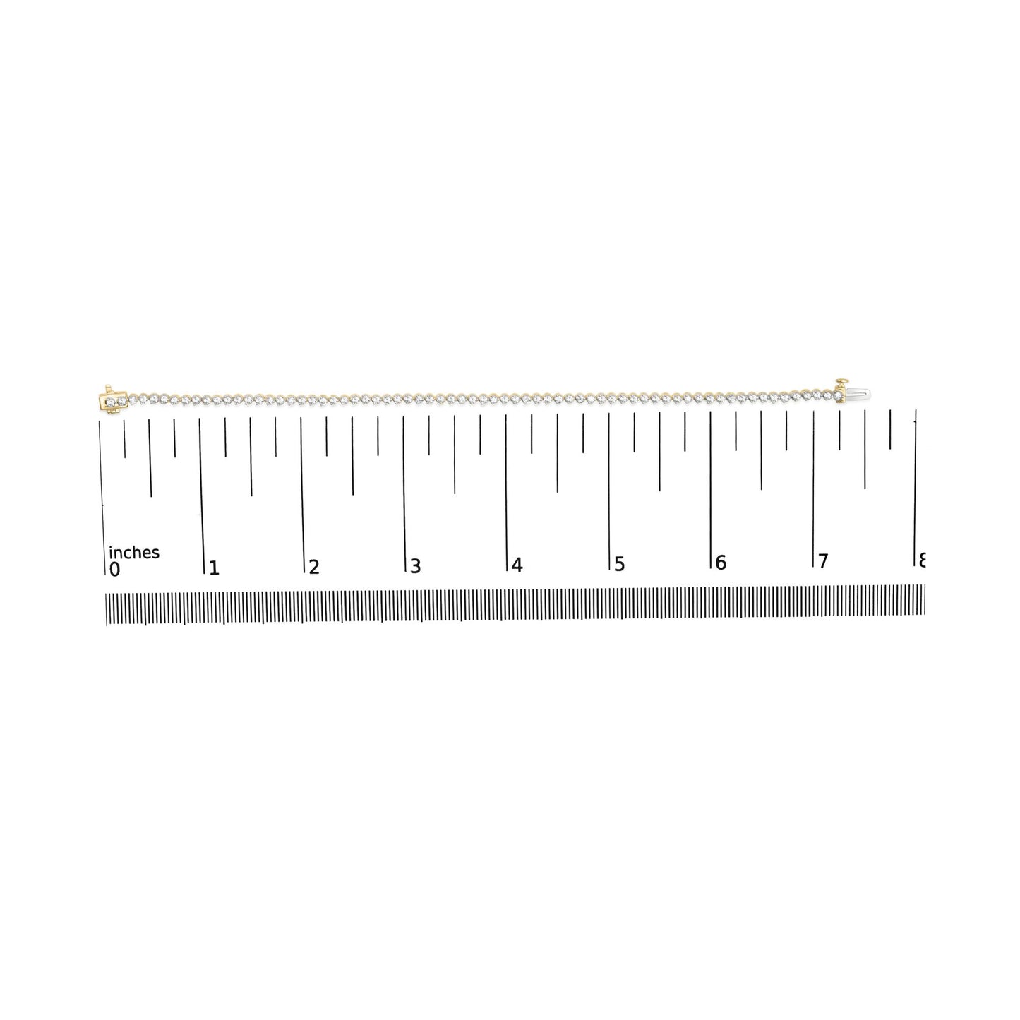 Top view of a yellow metal bracelet with round white gemstones in prong settings, shown on a scale.