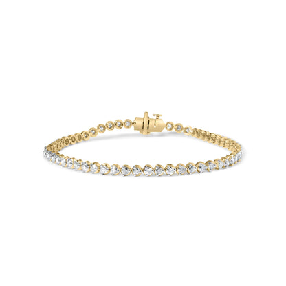 Close-up front angle of a yellow metal bracelet featuring two rows of round white gemstones in prong settings, shown unclasped on a white background.