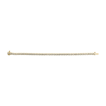 Top-down view of a yellow metal bracelet with a row of round white gemstones in prong settings.