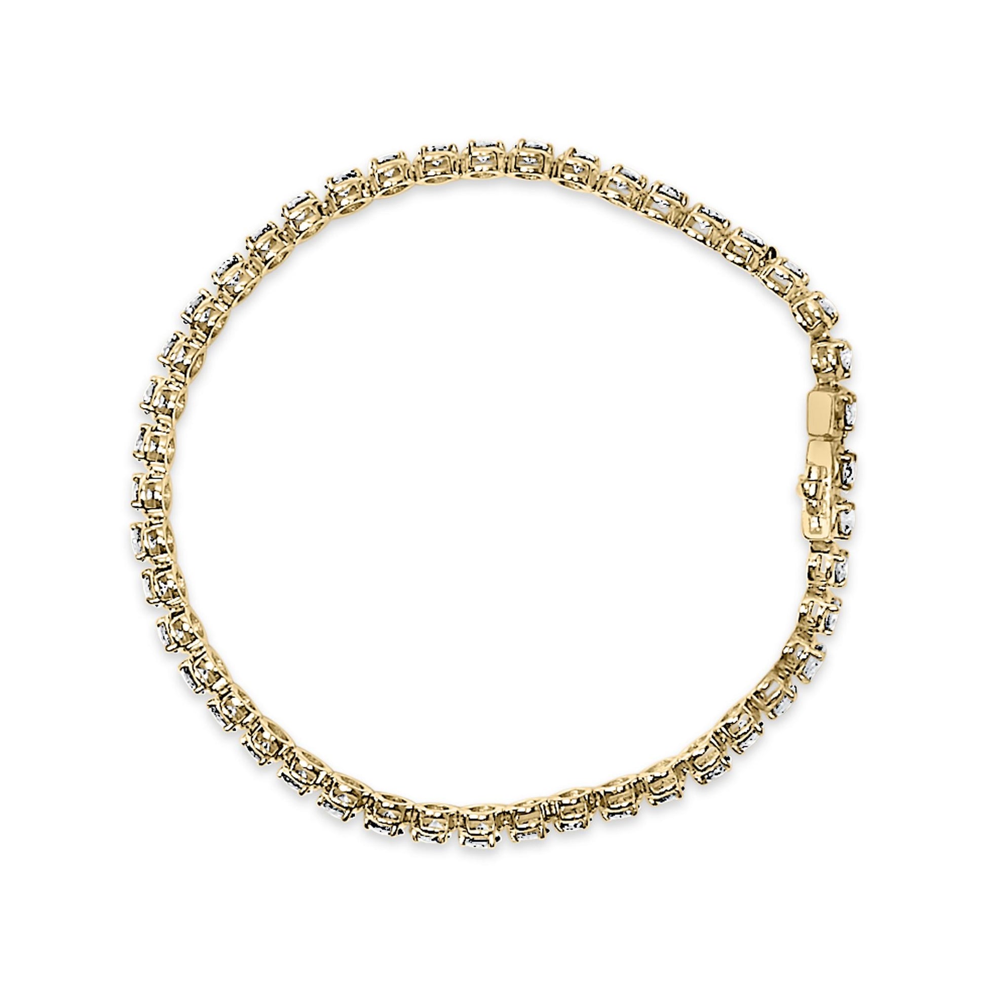 Close-up front angle view of a yellow bracelet featuring round white gemstones in prong settings, shown on a white background.