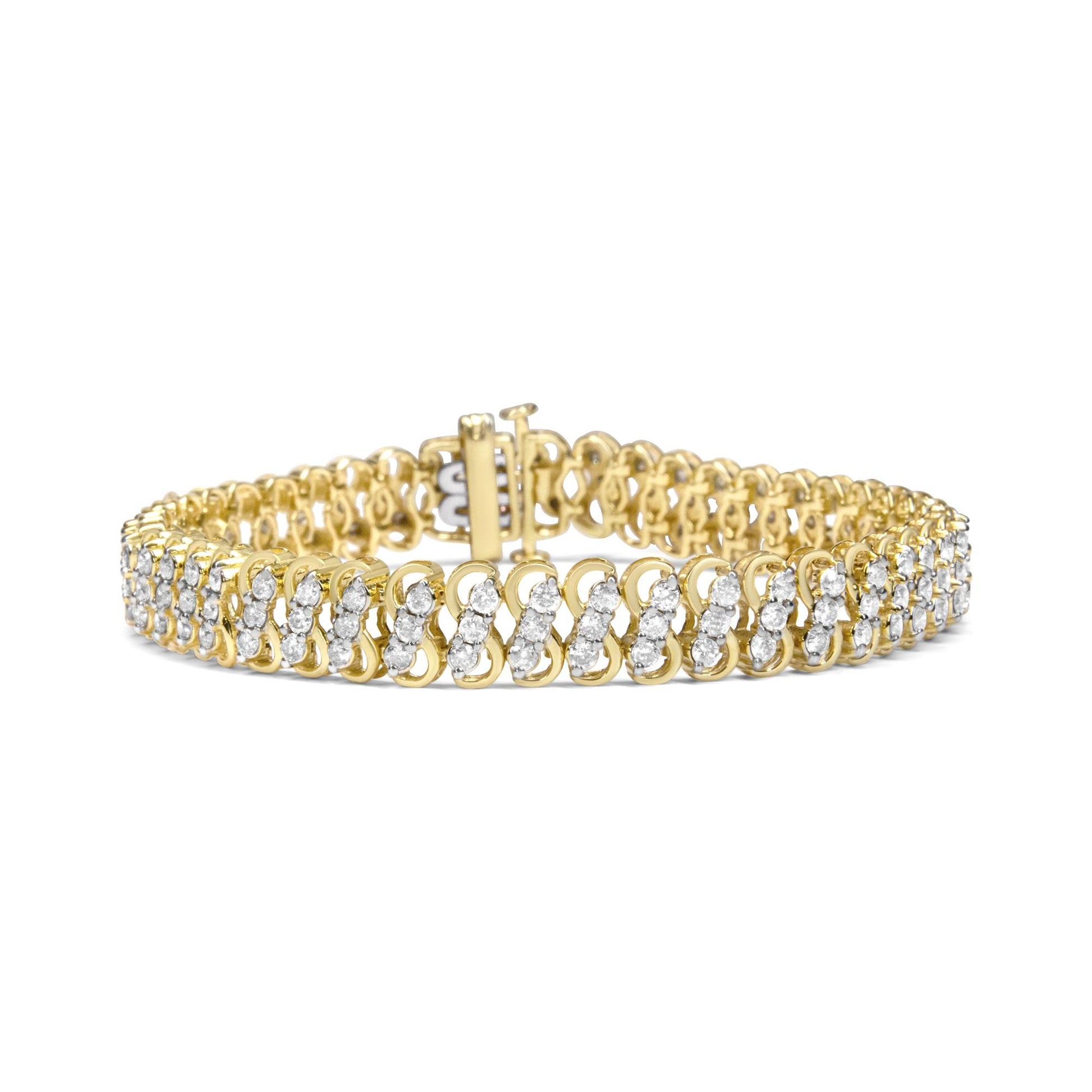 Yellow metal bracelet with multiple rows of round white gemstones in shared prong settings, shown from a front angled view.
