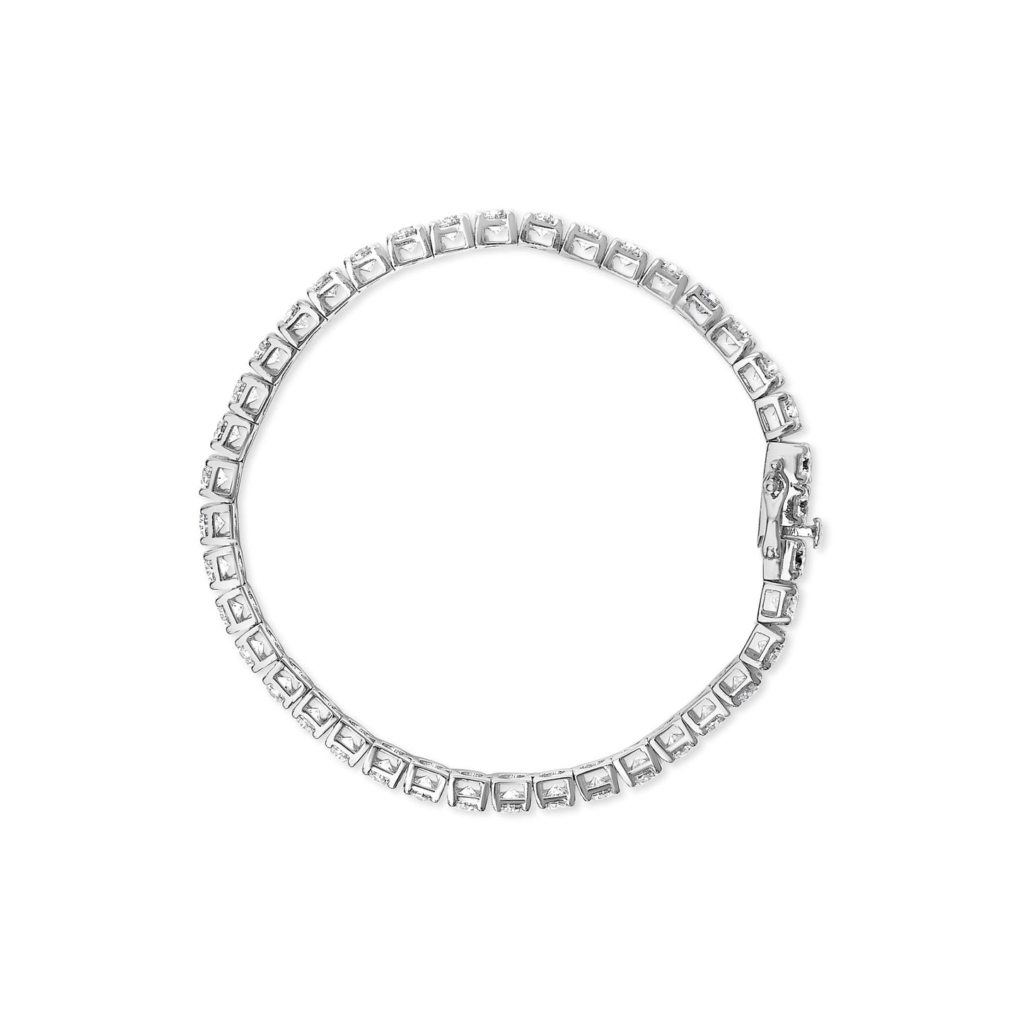 Top down view of a white metal bracelet with round white gemstones in 4-prong settings encircling the band.