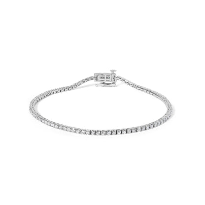 White metal bracelet with round white gemstones in 4-prong settings, shown from a front angle on a white background.