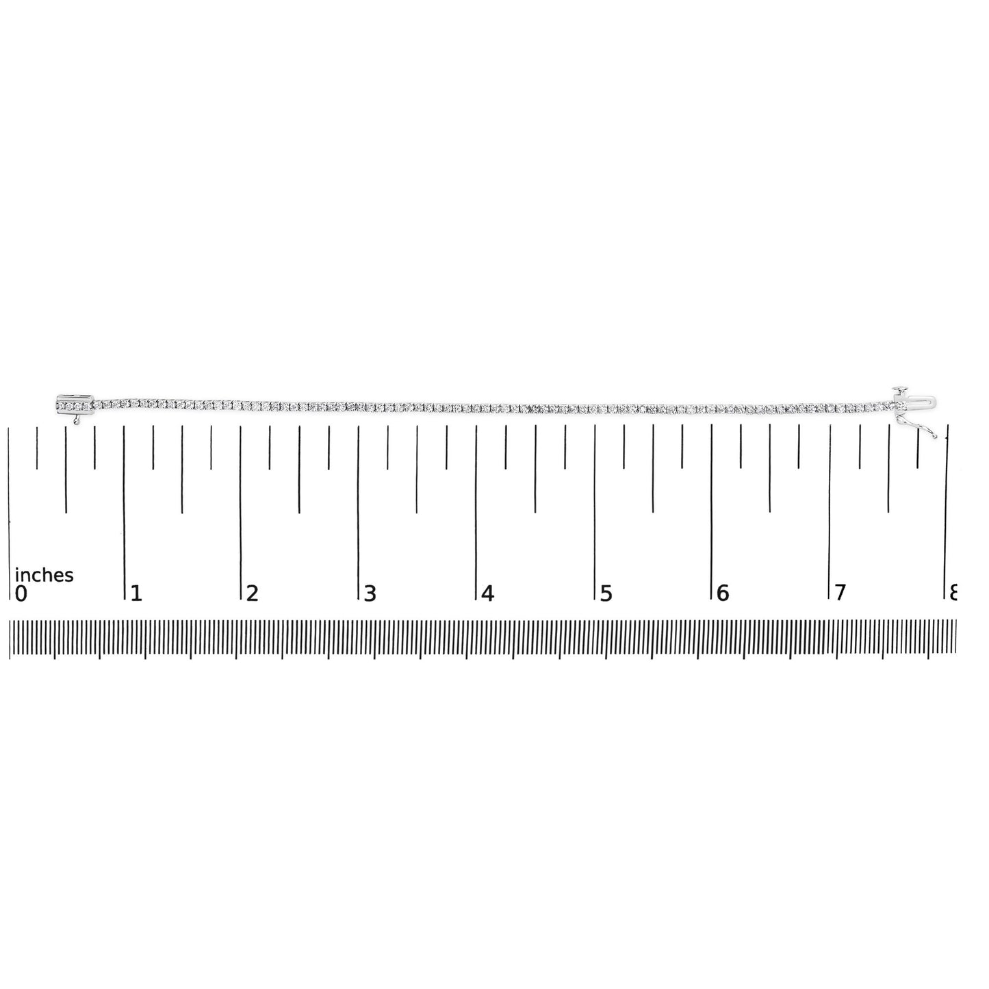 Top-down view of a white metal bracelet set with round white gemstones in 4-prong settings, displayed on a ruler for size reference.