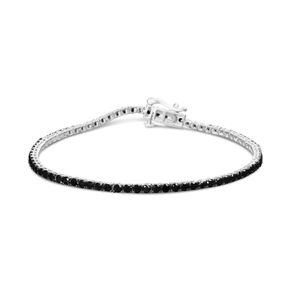 White metal bracelet with round black gemstones in prong settings, shown in a front angled view with clasp visible.