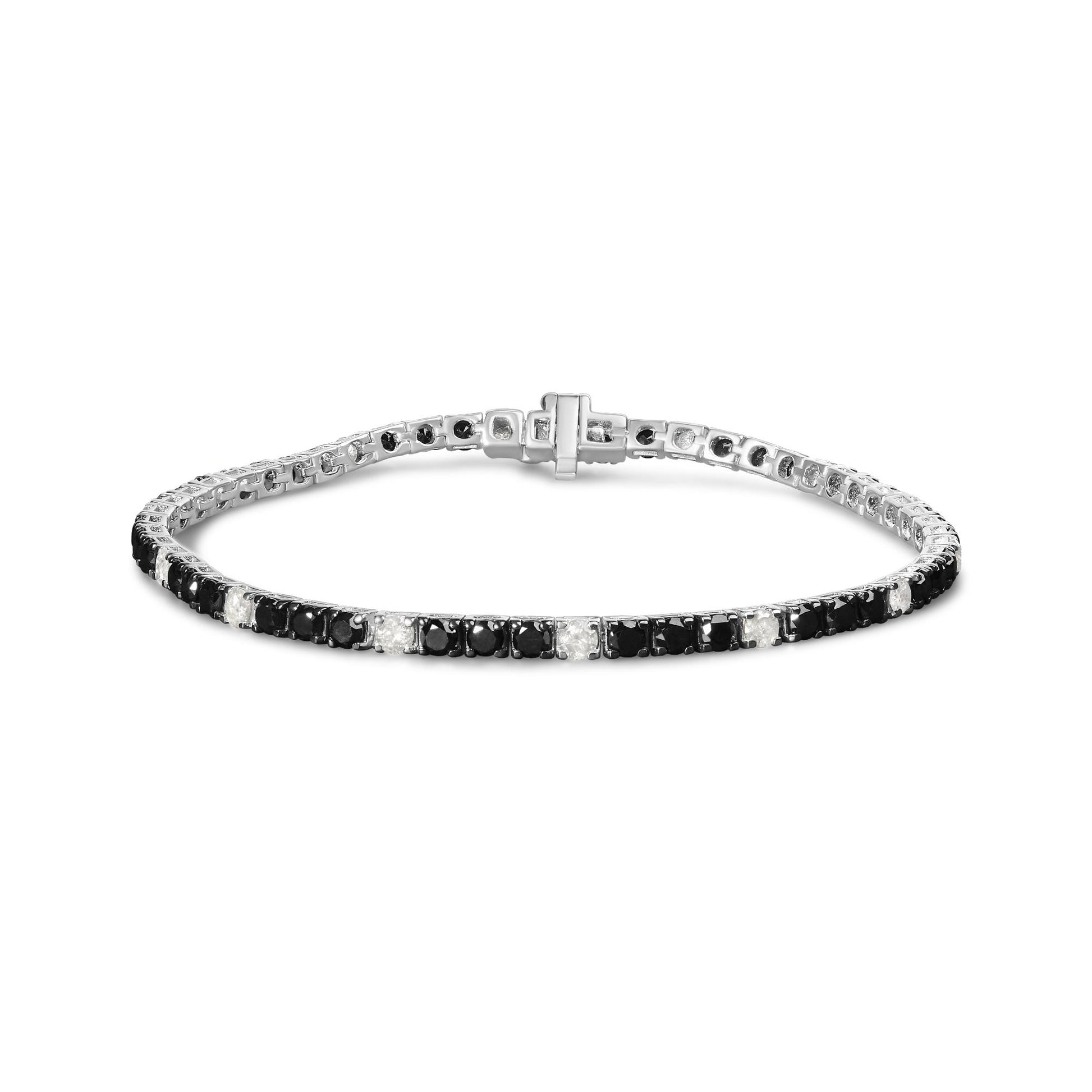 White metal bracelet with alternating black and white round gemstones in 4-prong settings, shown from a front-facing angle.