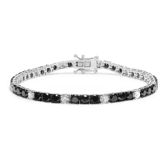 White metal bracelet with alternating white and black round gemstones in 4-prong settings, shown from a front angle on a white background.