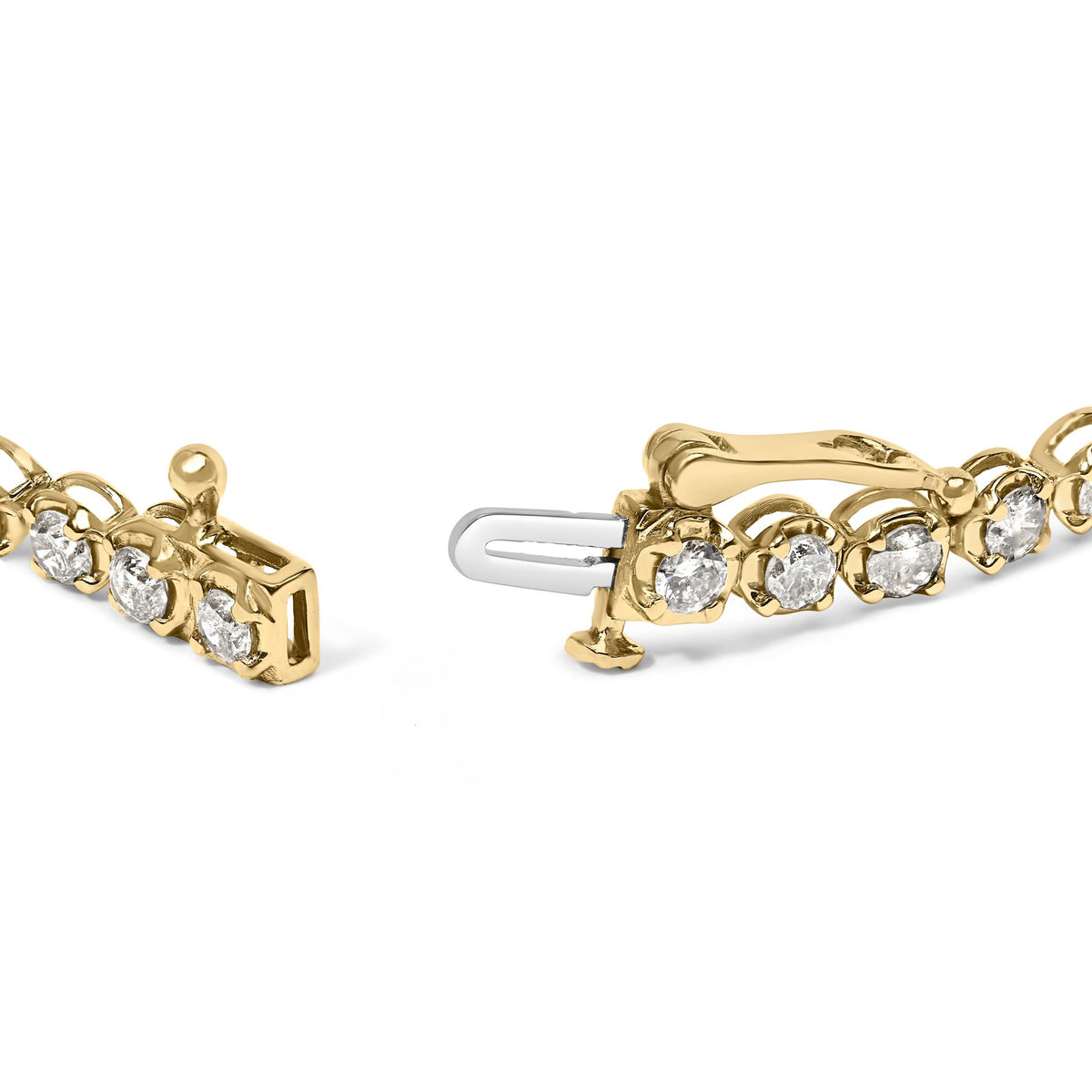 Close-up angled shot of a yellow metal bracelet segment featuring round white gemstones in prong settings.
