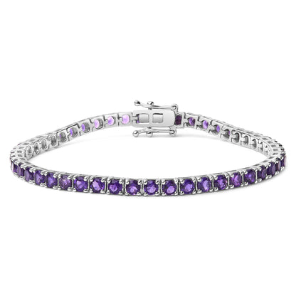 White metal bracelet with round purple gemstones set in four-prong settings, shown in a front-facing angle.