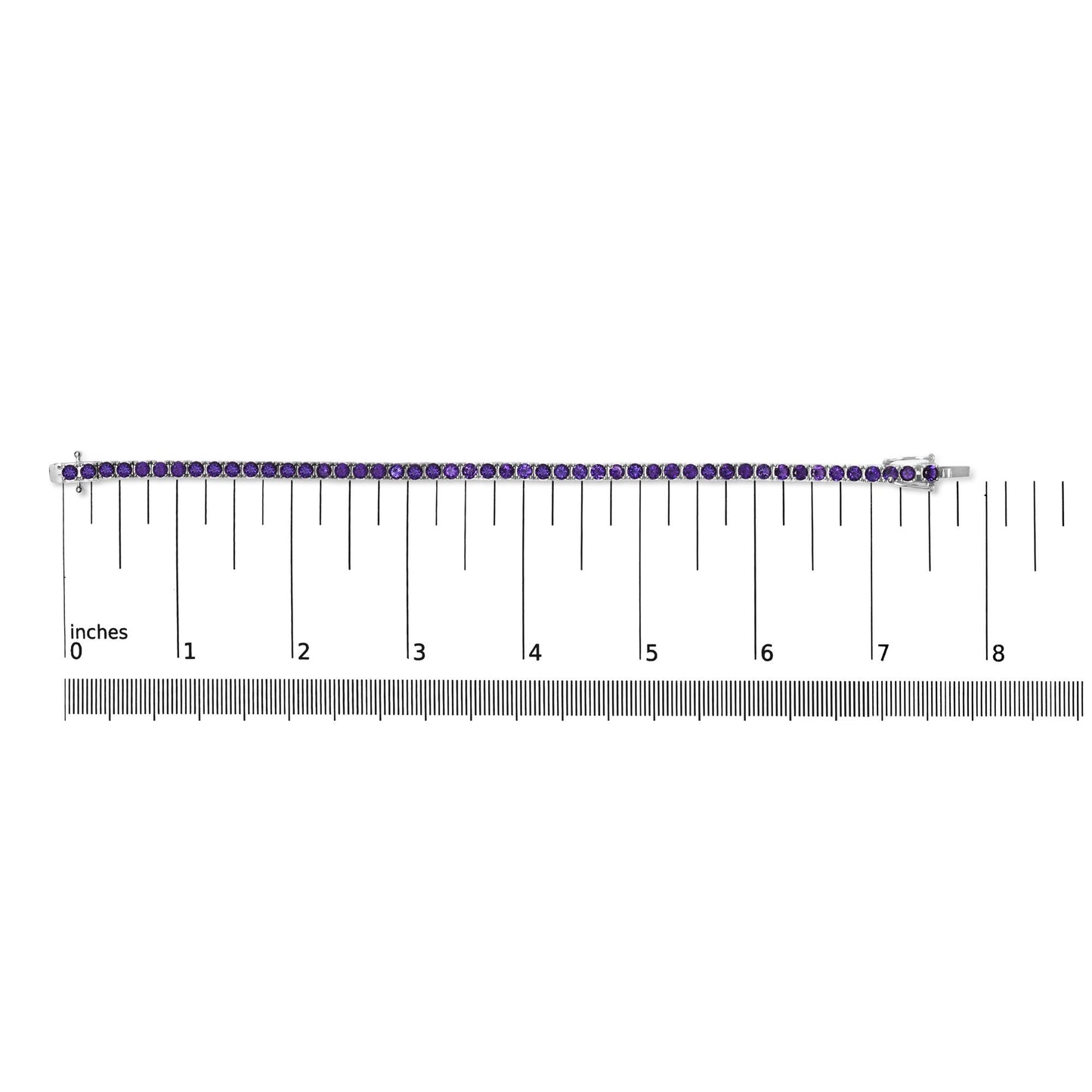 Straight-on shot of a white metal bracelet with round purple gemstones in 4-prong settings, placed on a ruler for size reference.