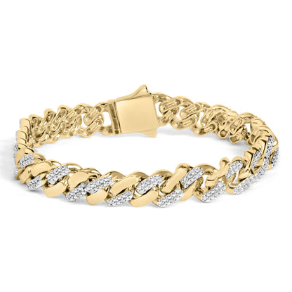 Yellow metal bracelet with alternating polished links and links set with small white gemstones, shown from a front angle.