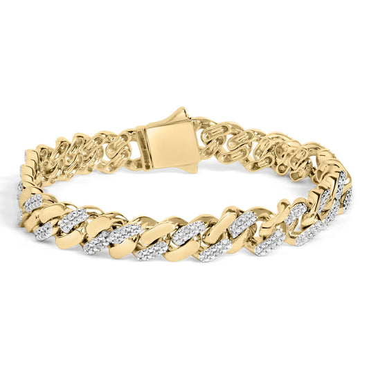 Yellow metal bracelet with alternating polished links and links set with small white gemstones, shown from a front angle.